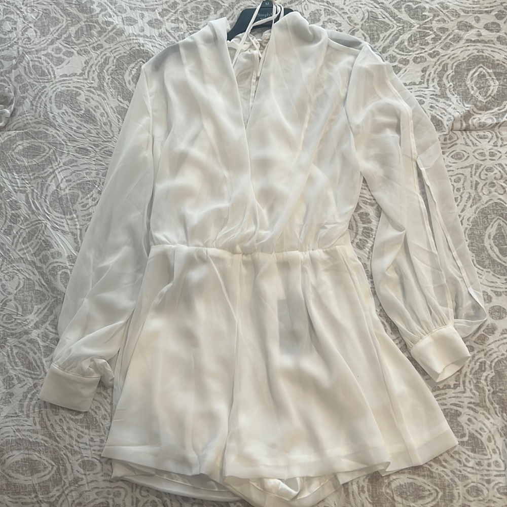 White slit long sleeve romper by Fashion Nova